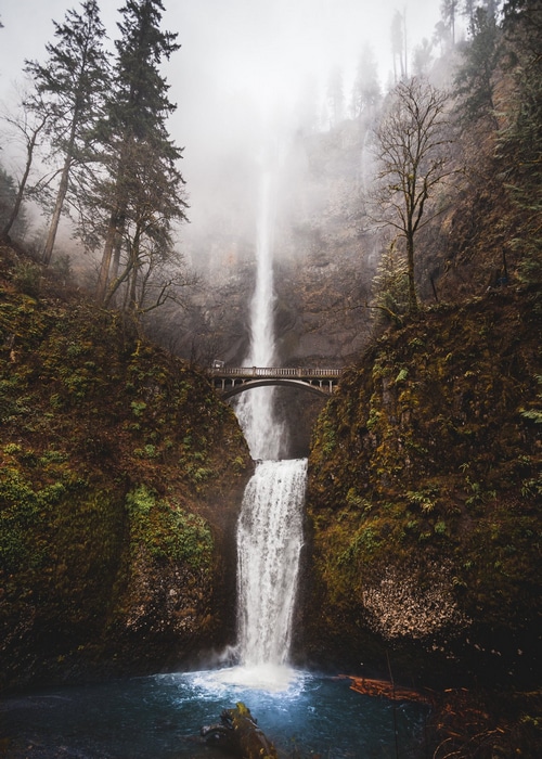 Multnomah Falls with a bridge in the mist