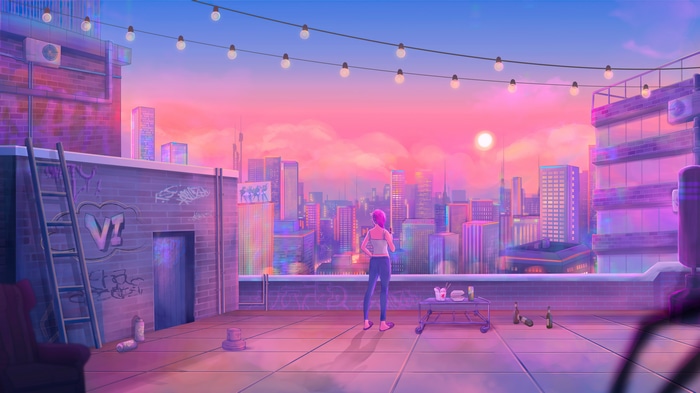 Rooftop overlooking city at sunset with graffiti