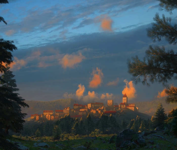Village on a hill at sunset with trees