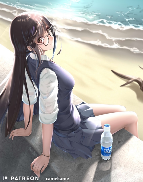 Schoolgirl with glasses at the beach