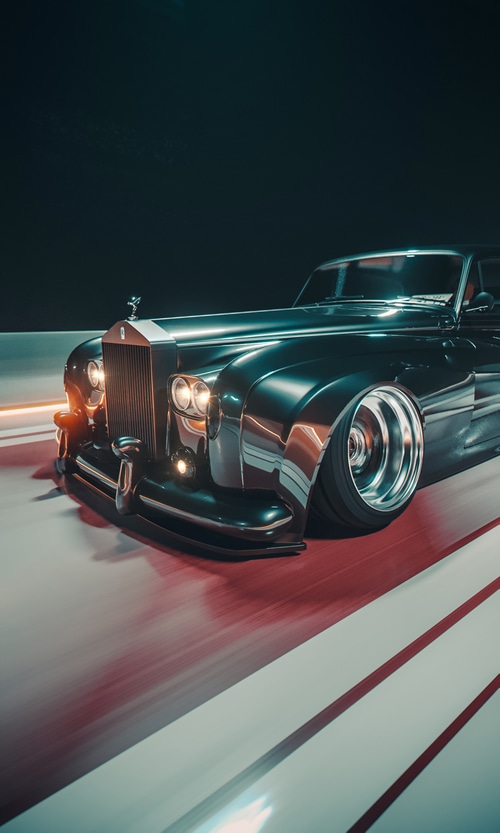 Stanced Black Rolls-Royce on a Red and White Road