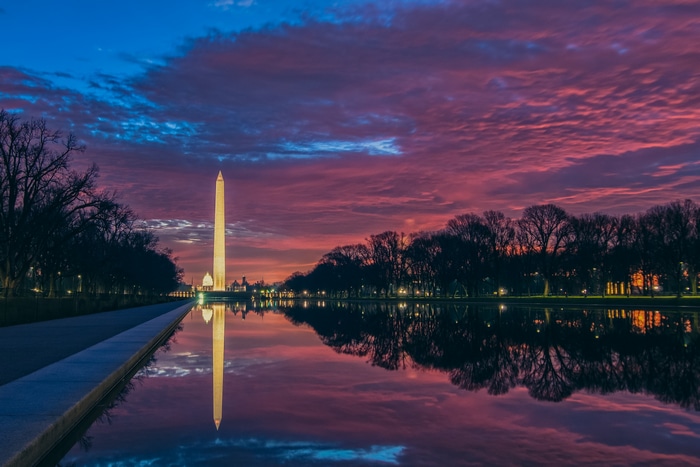 Washington Monument at sunset with reflection