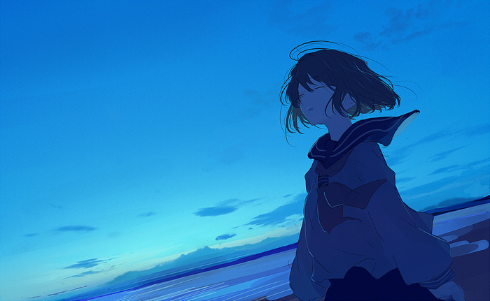 Girl in sailor uniform by the sea