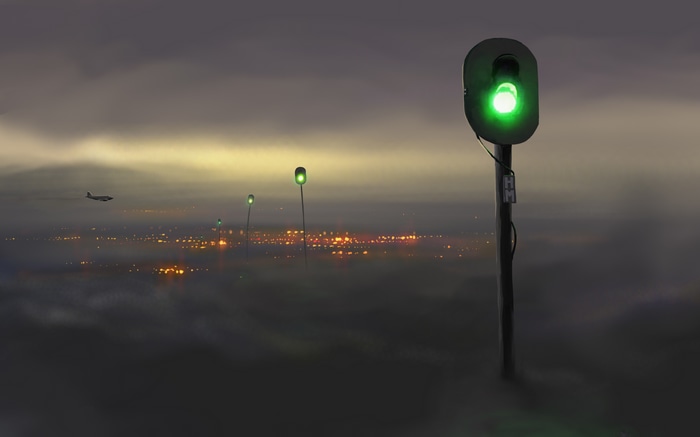 Airplane flying over a foggy cityscape with green signals