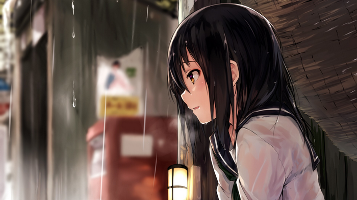 Girl in school uniform in the rain