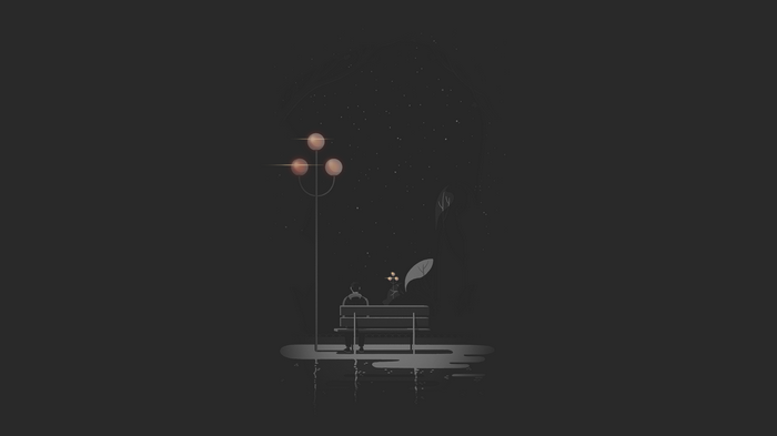 Person sitting on a bench under a street lamp at night