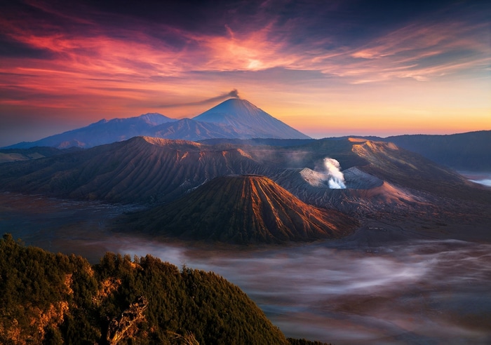 Bromo volcano landscape at sunrise with colorful sky