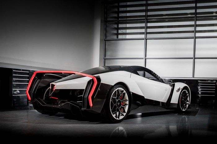 Vanda Dendrobium electric sports car in a garage