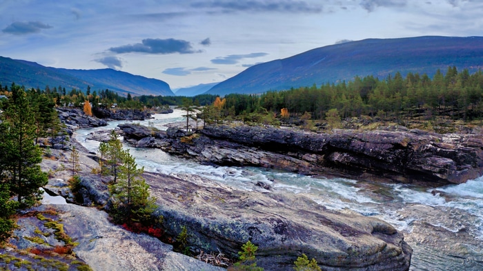 River flowing through rocky landscape in Norway