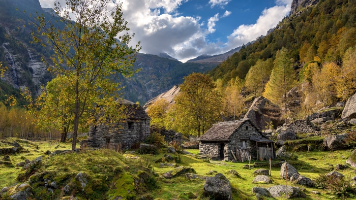 4K Switzerland Nature Landscape with Stone Houses and Autumn Trees