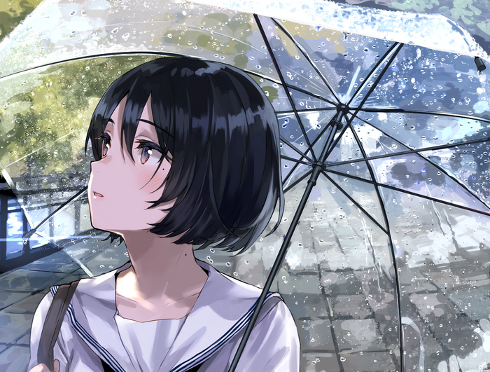 Girl with umbrella in the rain