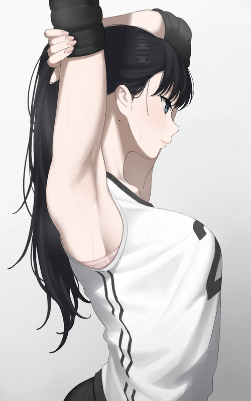 Girl in sportswear stretching her arms up