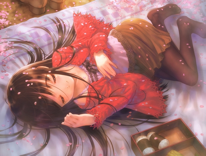 Anime girl lying on a blanket with cherry blossoms