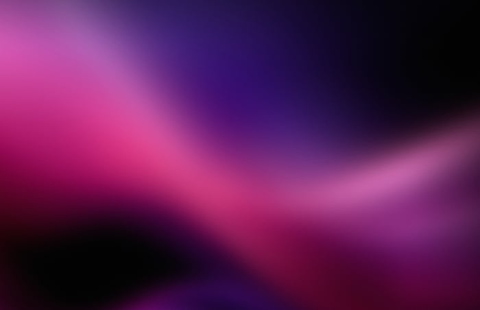 Dark blur abstract with pink and purple gradients