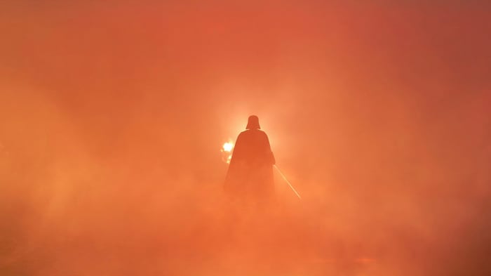 Darth Vader in a fiery, smoky environment