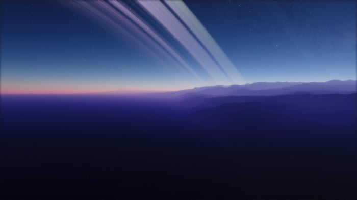 Twilight on a planet with rings and mountains
