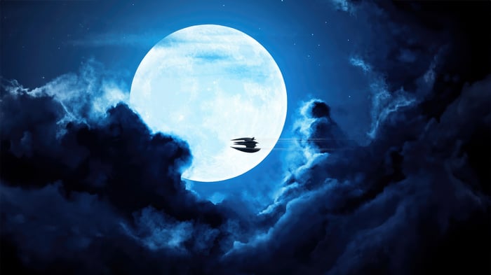 Star Wars Spaceship flying past a large moon