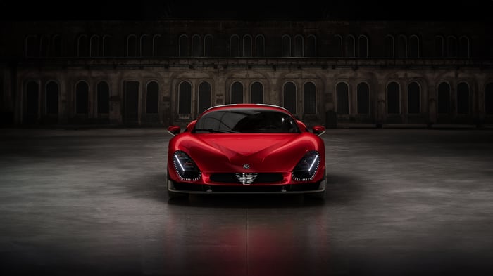 Red Alfa Romeo 33 Stradale in a dark hall