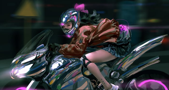 Girl in helmet riding a chrome motorcycle at night