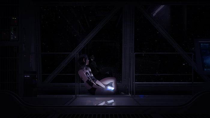 Woman sitting by a window looking at stars