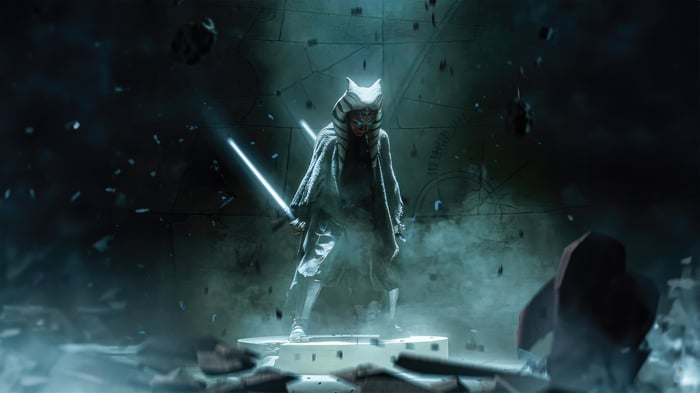 Ahsoka Tano with two lightsabers in a destroyed environment