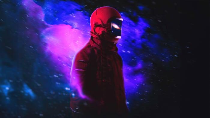 Astronaut in a red suit with a glowing visor