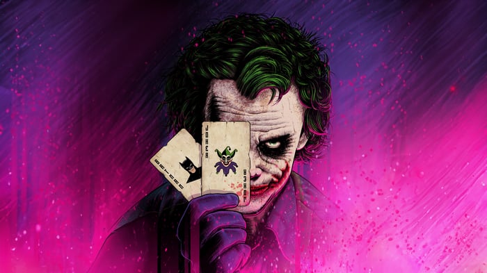 The Joker holding playing cards