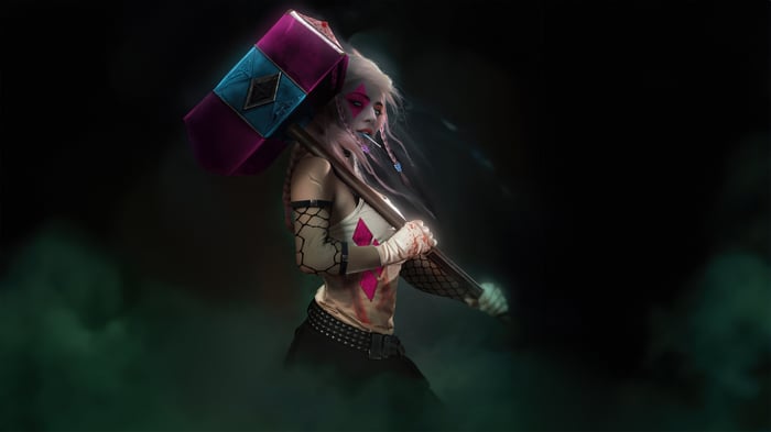 Harley Quinn holding a large hammer