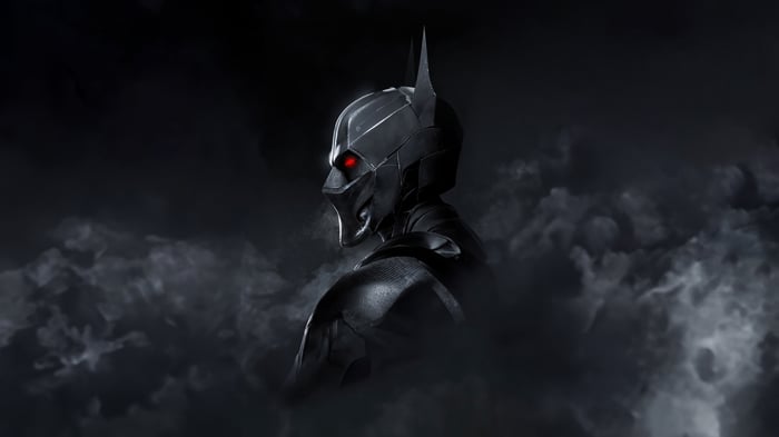 Batman in dark clouds with red eyes
