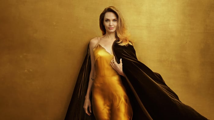 Angelina Jolie in a golden dress for Vogue