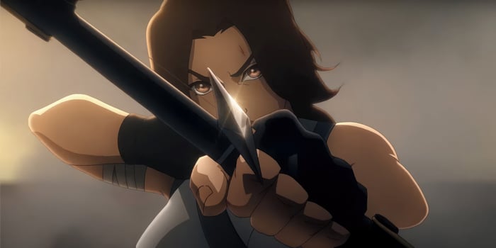 Lara Croft from Tomb Raider aiming a bow