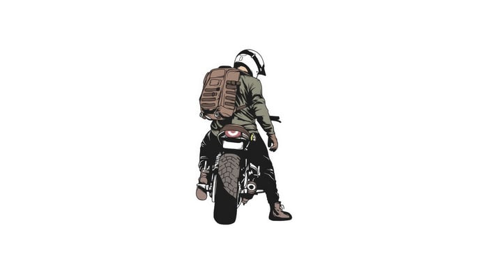 Man with backpack on motorcycle