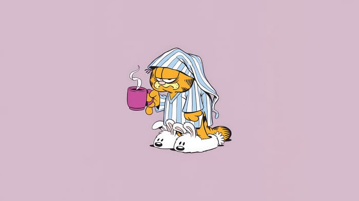 Garfield in Pajamas Holding a Coffee Cup