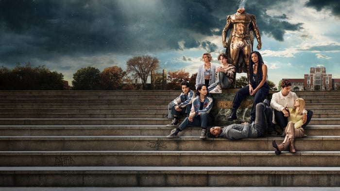 Gen V cast on steps with headless statue