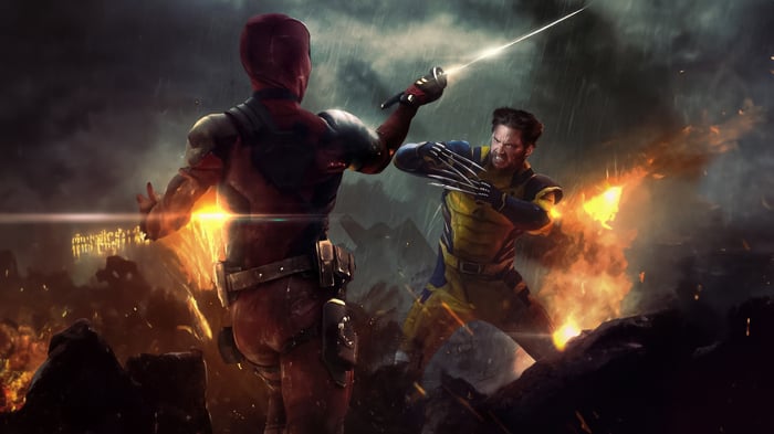 Deadpool and Wolverine fight amidst fire and rain