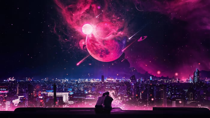 Couple watches a pink planet and nebula over a city