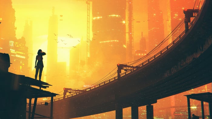 Woman on rooftop overlooking a futuristic city at sunrise