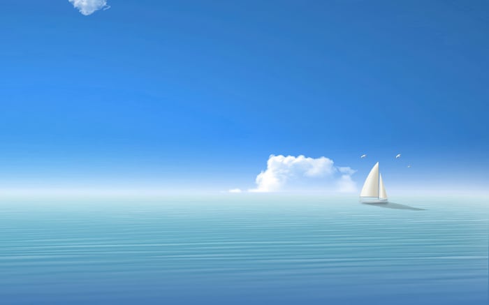 Minimalist sailboat on a calm sea under a blue sky