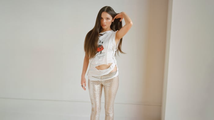Olivia Rodrigo in a white t-shirt and sparkly pants