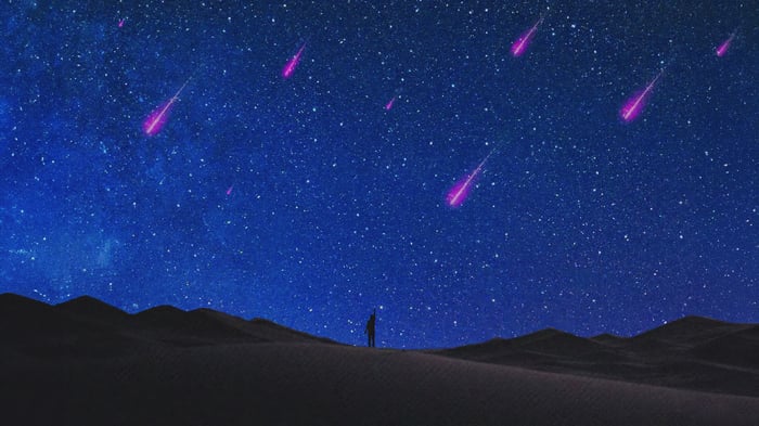 Shooting Stars Over Desert Dunes