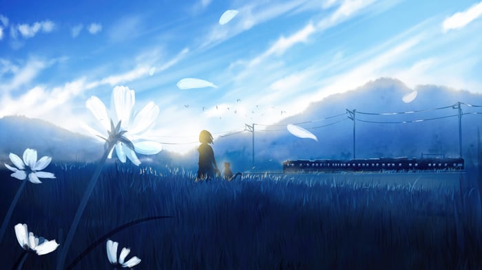 A girl and a cat watch a distant train