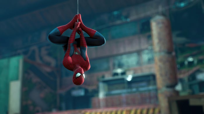 Spider-Man hanging upside down