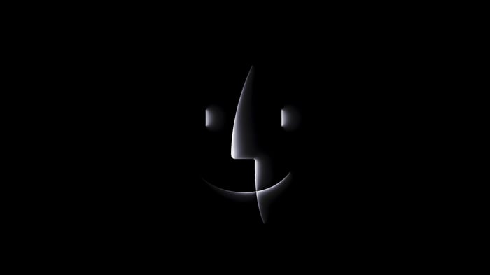 Apple OS9 Finder Logo on Dark Background
