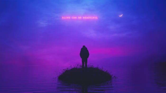 Silhouette of a person on an island with text