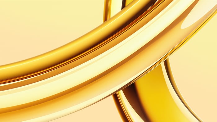 Abstract golden rings on a yellow background