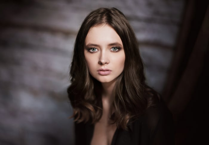 Woman with blue eyes and brown hair