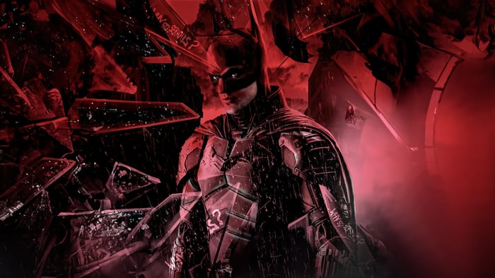 The Batman in a red, shattered environment