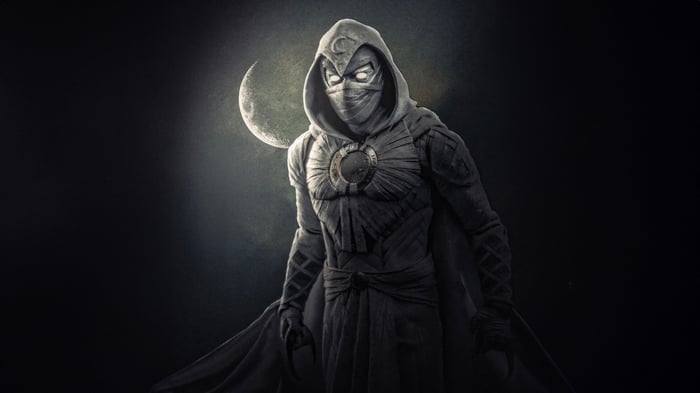 Moon Knight in front of a crescent moon