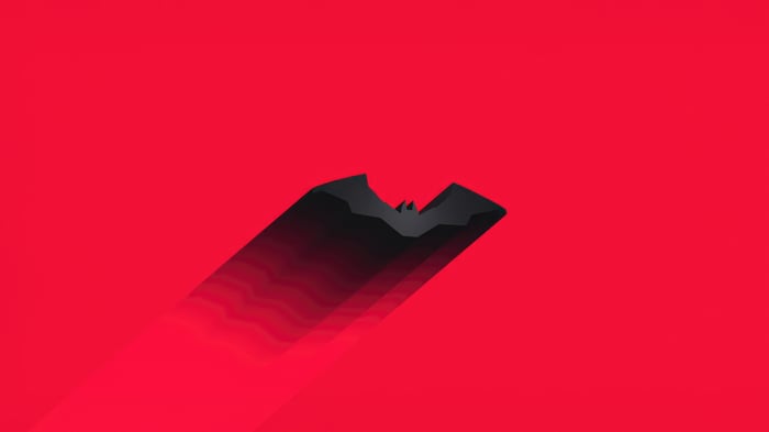 Batman Logo on Red Background