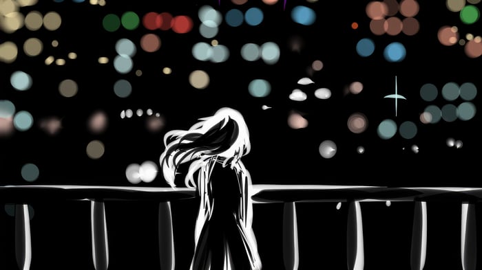 Girl looking at city lights at night